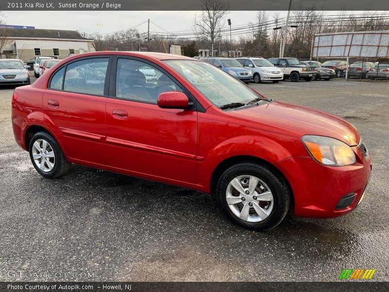 Sunset Orange / Beige 2011 Kia Rio LX