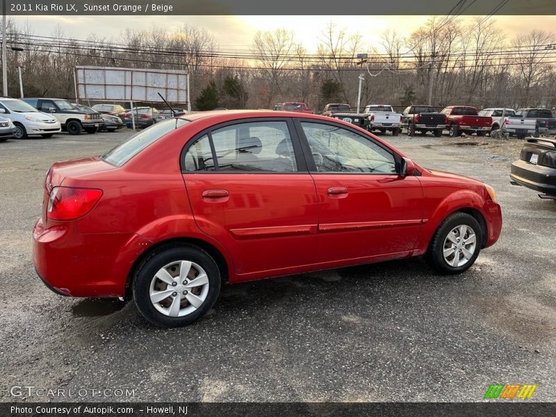 Sunset Orange / Beige 2011 Kia Rio LX