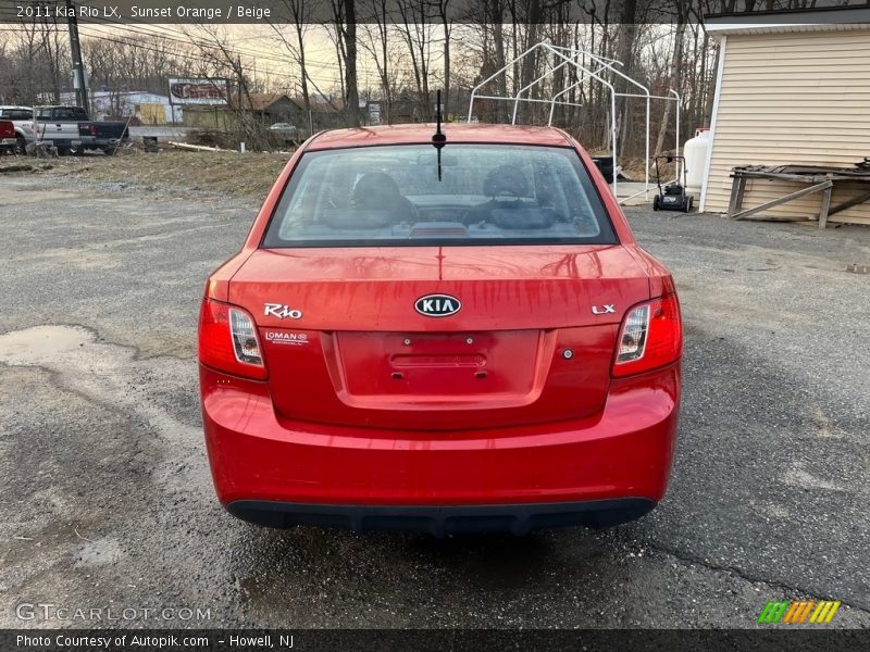 Sunset Orange / Beige 2011 Kia Rio LX