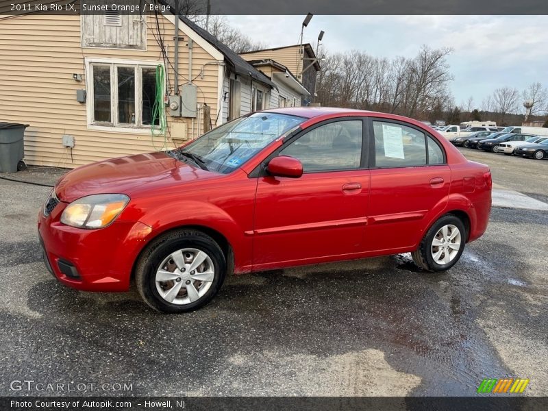 Sunset Orange / Beige 2011 Kia Rio LX