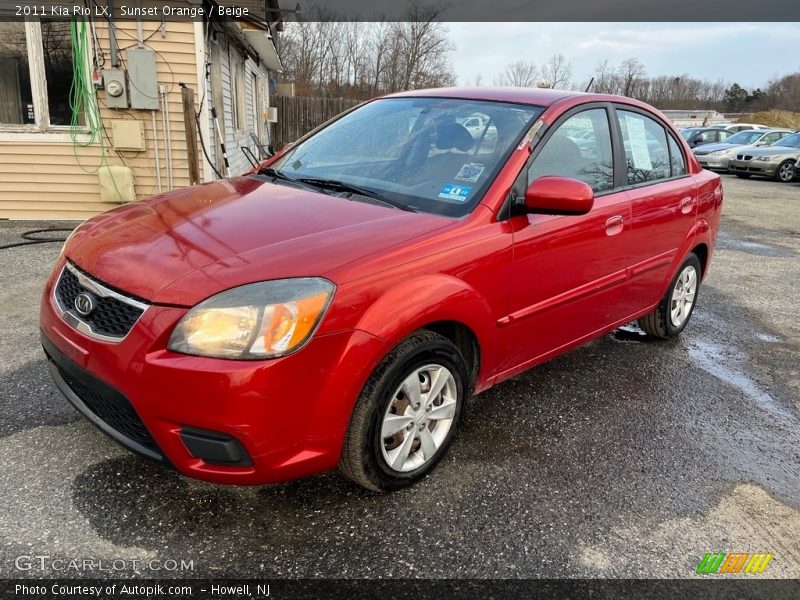 Sunset Orange / Beige 2011 Kia Rio LX