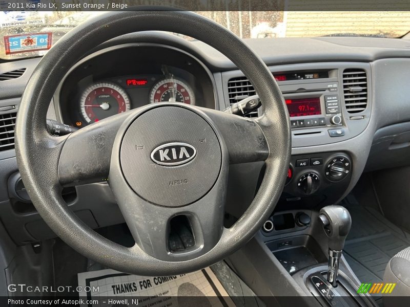 Sunset Orange / Beige 2011 Kia Rio LX