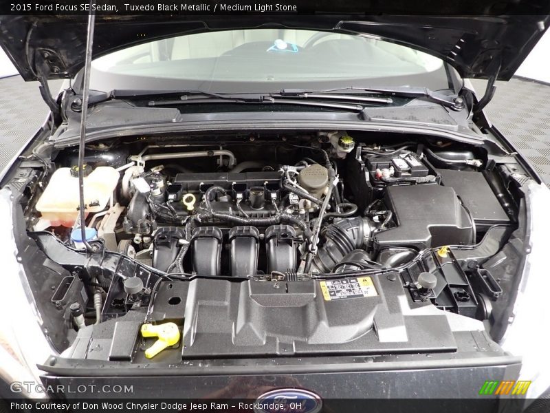 Tuxedo Black Metallic / Medium Light Stone 2015 Ford Focus SE Sedan