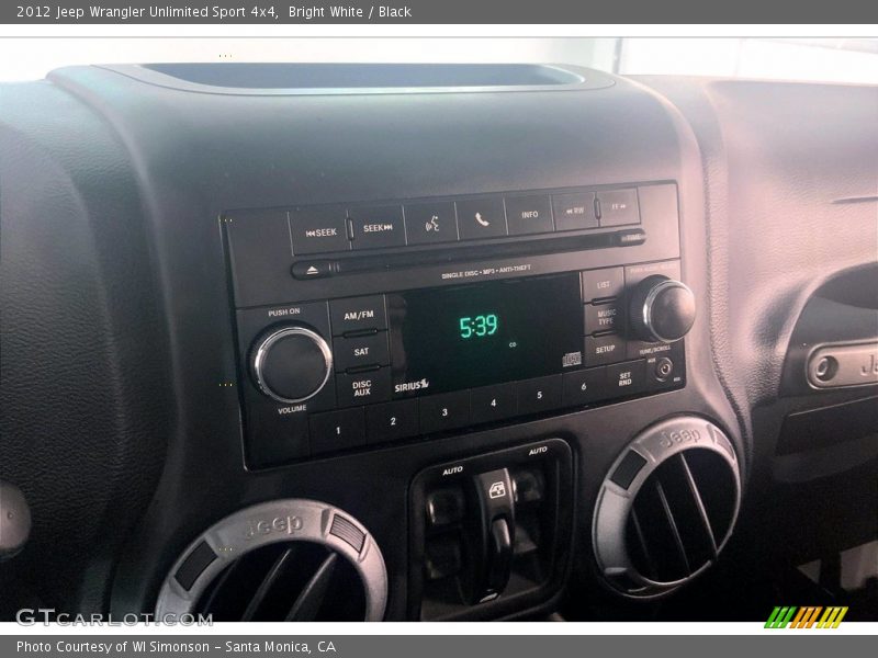 Bright White / Black 2012 Jeep Wrangler Unlimited Sport 4x4