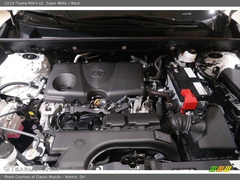 Super White / Black 2019 Toyota RAV4 LE