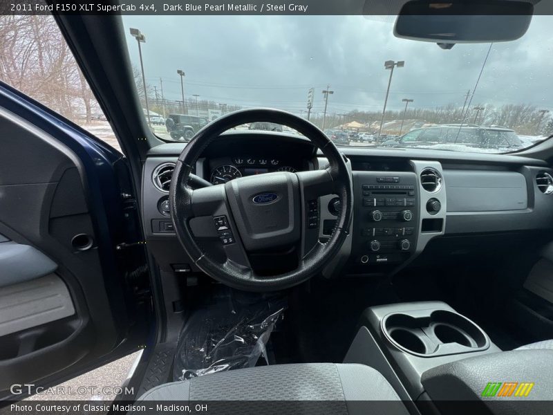 Dark Blue Pearl Metallic / Steel Gray 2011 Ford F150 XLT SuperCab 4x4