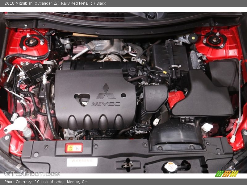 Rally Red Metallic / Black 2018 Mitsubishi Outlander ES