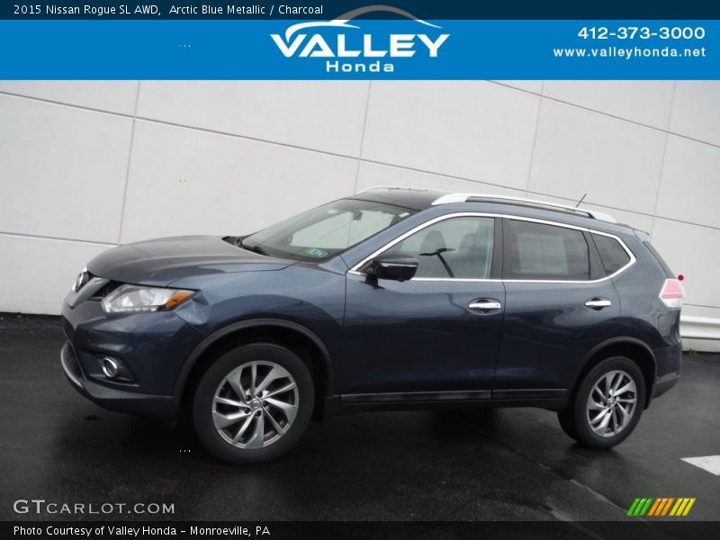 Arctic Blue Metallic / Charcoal 2015 Nissan Rogue SL AWD