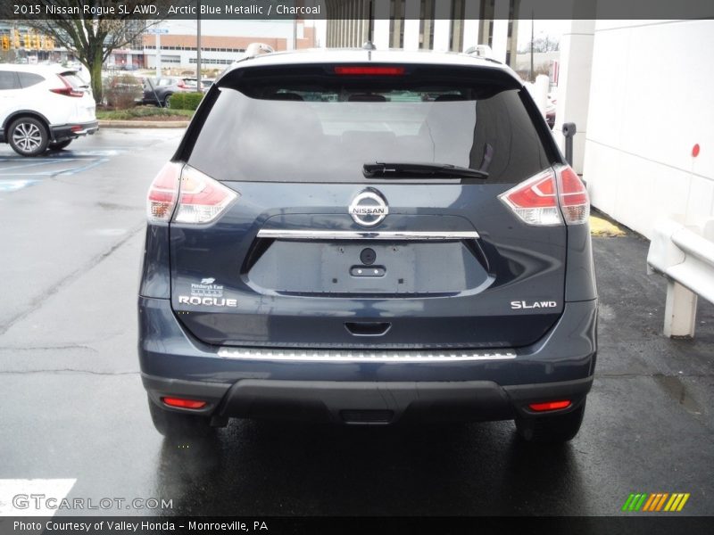 Arctic Blue Metallic / Charcoal 2015 Nissan Rogue SL AWD