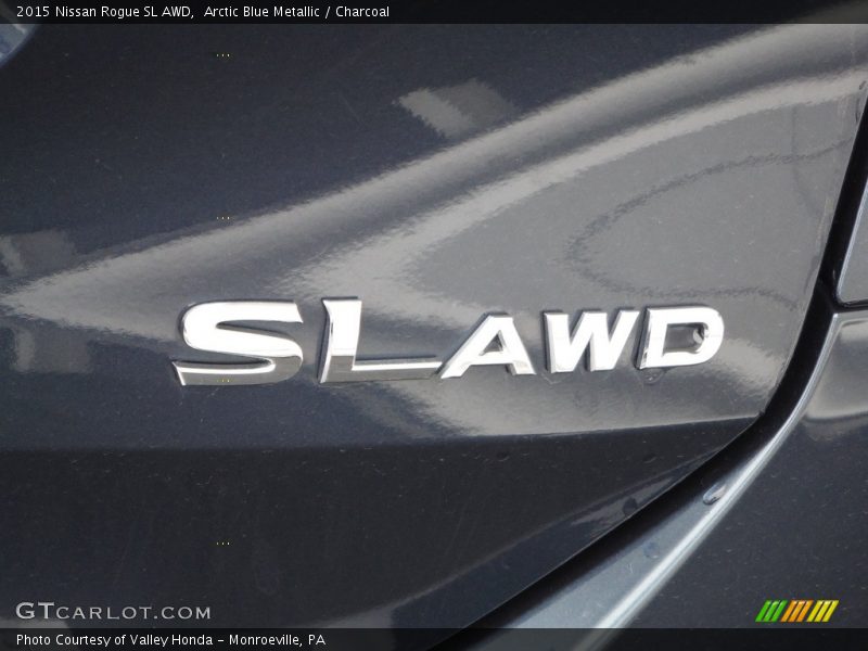 Arctic Blue Metallic / Charcoal 2015 Nissan Rogue SL AWD