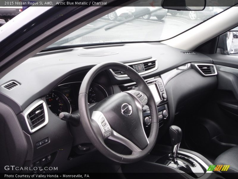Arctic Blue Metallic / Charcoal 2015 Nissan Rogue SL AWD