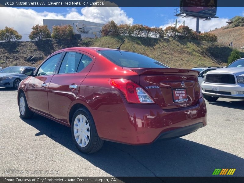 Cayenne Red Metallic / Charcoal 2019 Nissan Versa SV