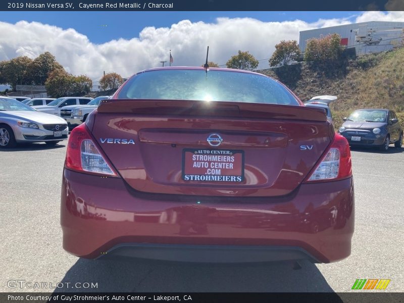 Cayenne Red Metallic / Charcoal 2019 Nissan Versa SV