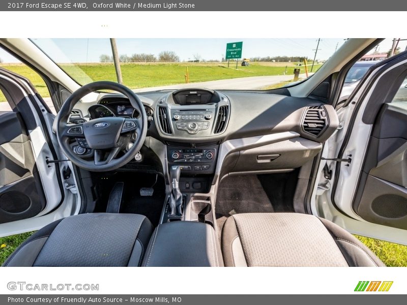 Oxford White / Medium Light Stone 2017 Ford Escape SE 4WD