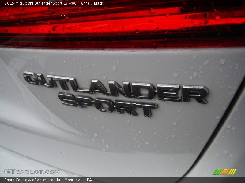  2015 Outlander Sport ES AWC Logo