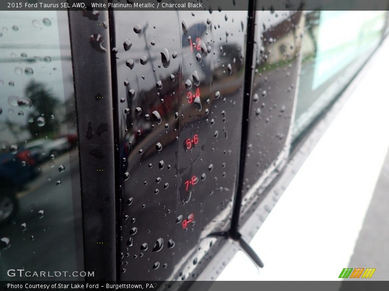 White Platinum Metallic / Charcoal Black 2015 Ford Taurus SEL AWD