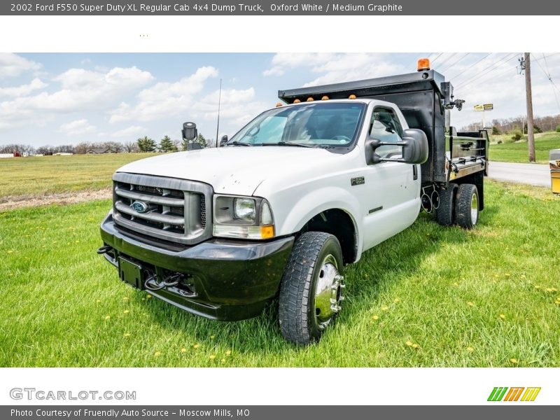 Front 3/4 View of 2002 F550 Super Duty XL Regular Cab 4x4 Dump Truck