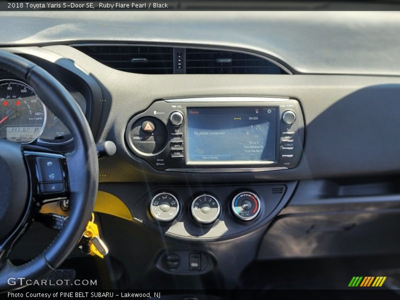 Ruby Flare Pearl / Black 2018 Toyota Yaris 5-Door SE