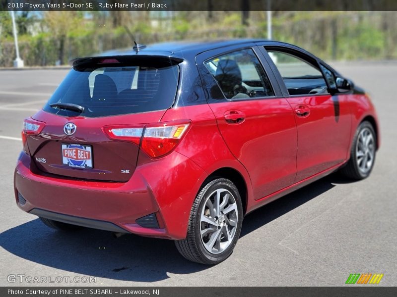 Ruby Flare Pearl / Black 2018 Toyota Yaris 5-Door SE