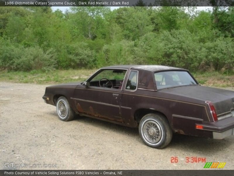 Dark Red Metallic / Dark Red 1986 Oldsmobile Cutlass Supreme Coupe