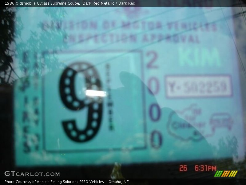 Dark Red Metallic / Dark Red 1986 Oldsmobile Cutlass Supreme Coupe