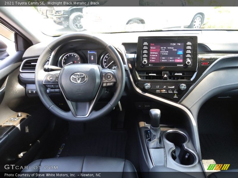 Dashboard of 2021 Camry SE