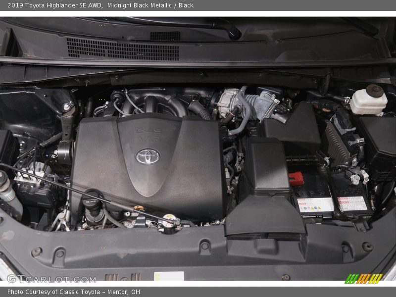 Midnight Black Metallic / Black 2019 Toyota Highlander SE AWD