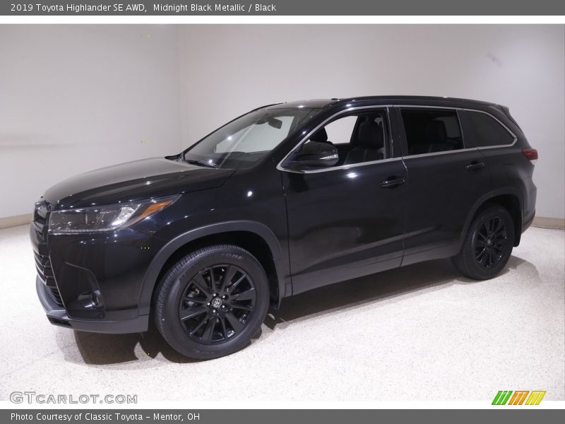 Midnight Black Metallic / Black 2019 Toyota Highlander SE AWD