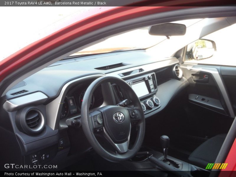 Barcelona Red Metallic / Black 2017 Toyota RAV4 LE AWD