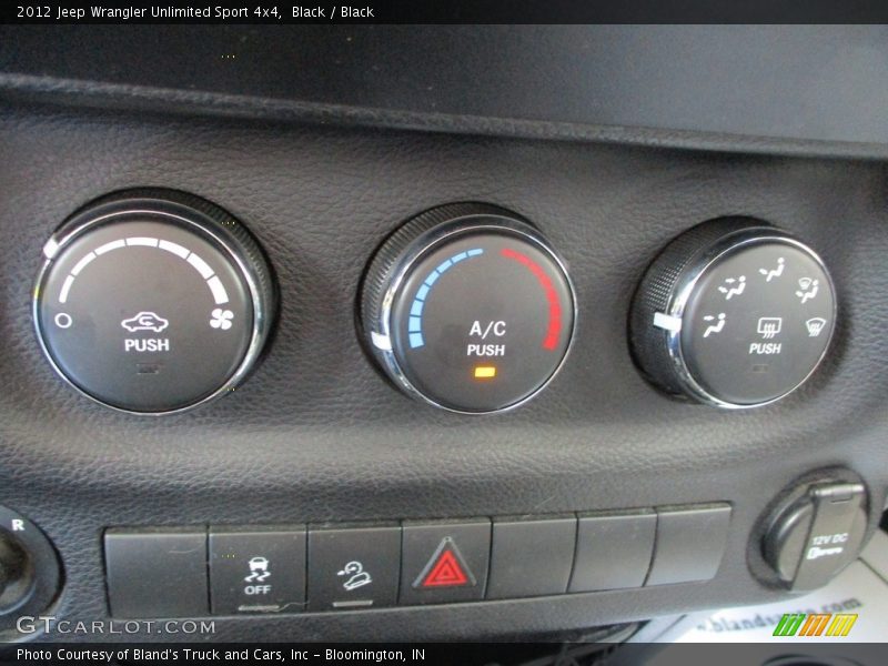 Black / Black 2012 Jeep Wrangler Unlimited Sport 4x4