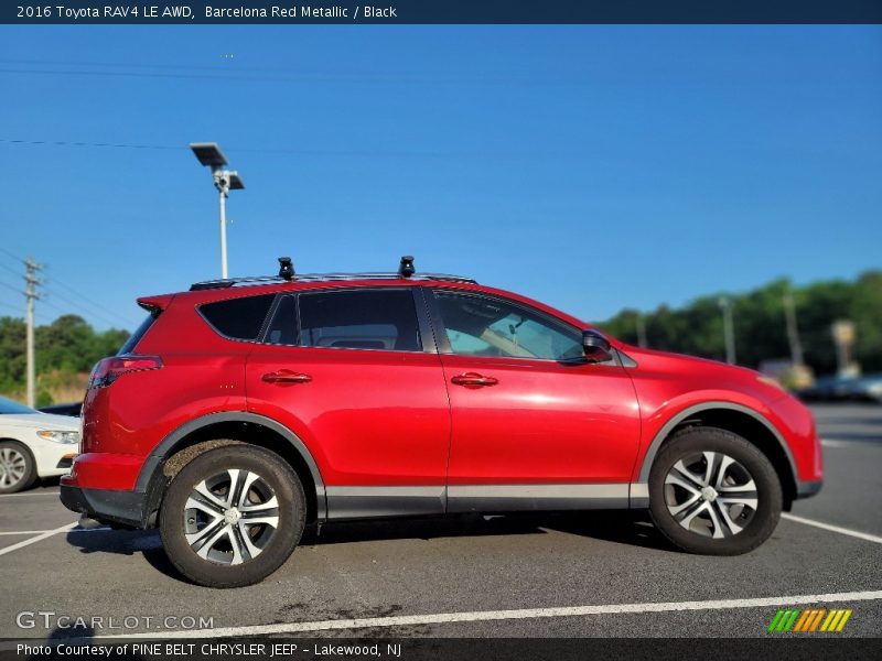 Barcelona Red Metallic / Black 2016 Toyota RAV4 LE AWD