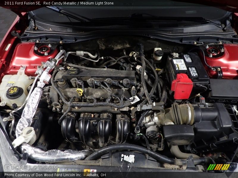 Red Candy Metallic / Medium Light Stone 2011 Ford Fusion SE