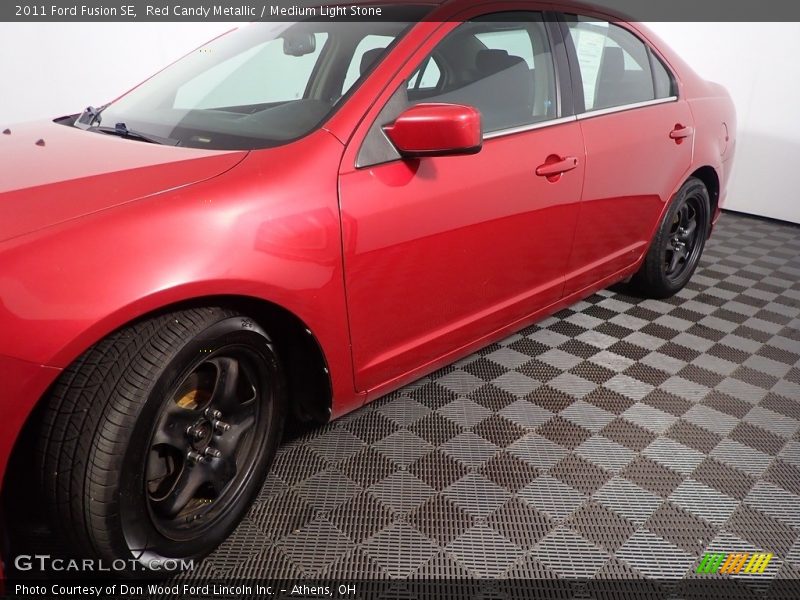 Red Candy Metallic / Medium Light Stone 2011 Ford Fusion SE