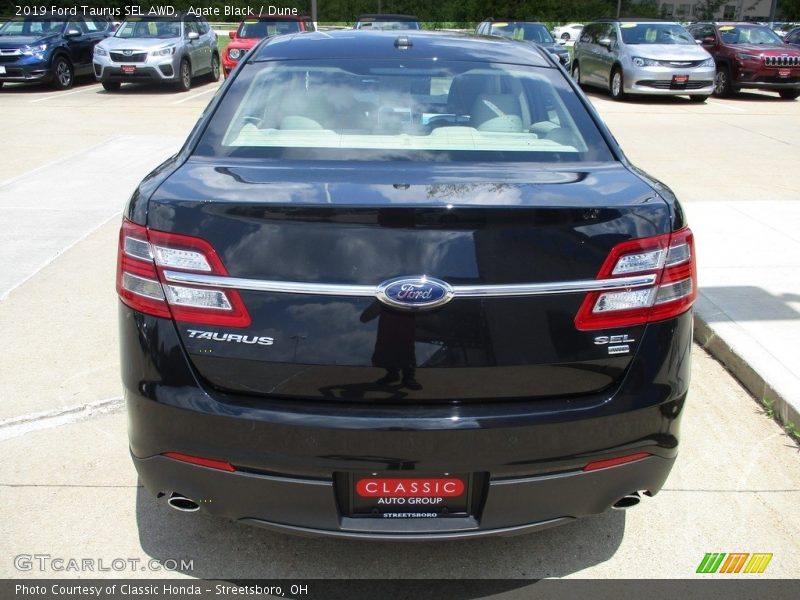Agate Black / Dune 2019 Ford Taurus SEL AWD