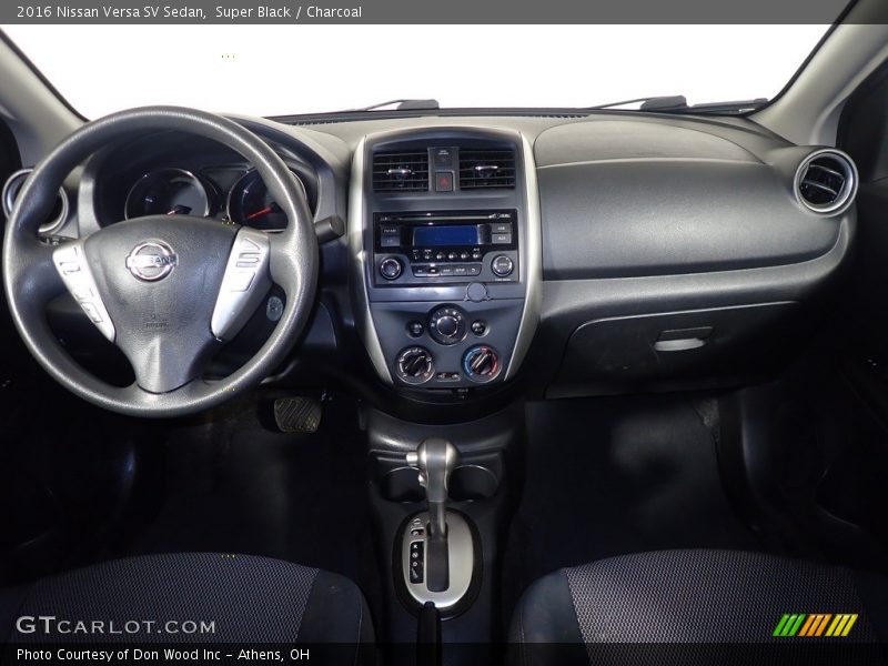 Super Black / Charcoal 2016 Nissan Versa SV Sedan