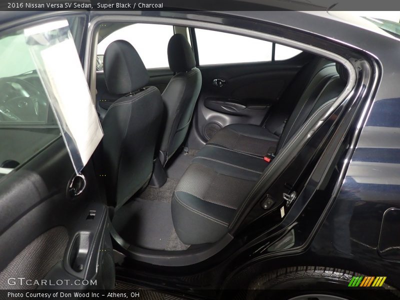 Super Black / Charcoal 2016 Nissan Versa SV Sedan