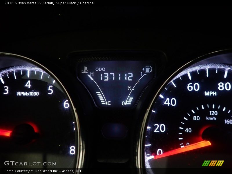 Super Black / Charcoal 2016 Nissan Versa SV Sedan