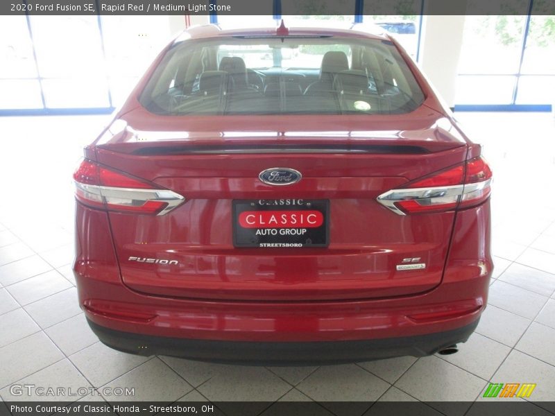 Rapid Red / Medium Light Stone 2020 Ford Fusion SE