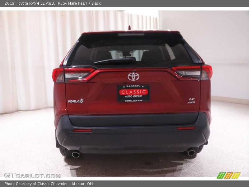 Ruby Flare Pearl / Black 2019 Toyota RAV4 LE AWD