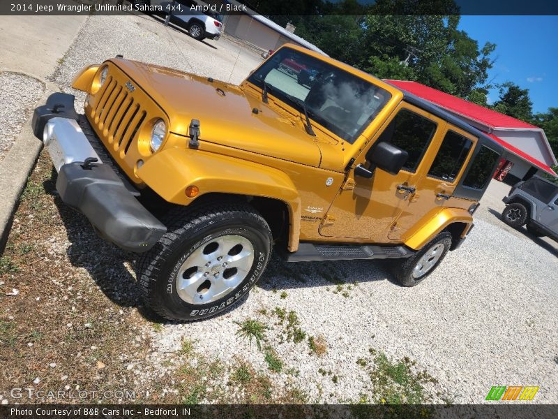 Front 3/4 View of 2014 Wrangler Unlimited Sahara 4x4