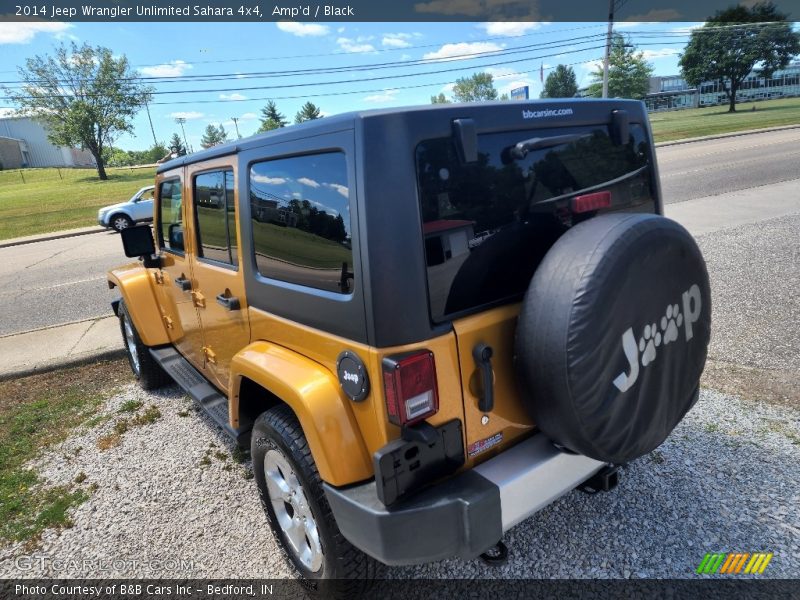 Amp'd / Black 2014 Jeep Wrangler Unlimited Sahara 4x4