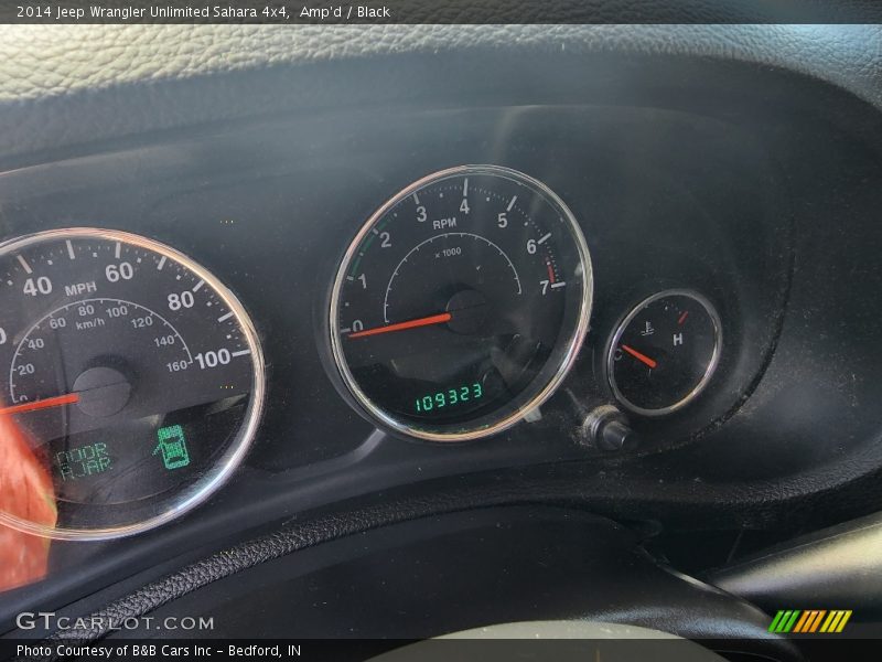 Amp'd / Black 2014 Jeep Wrangler Unlimited Sahara 4x4