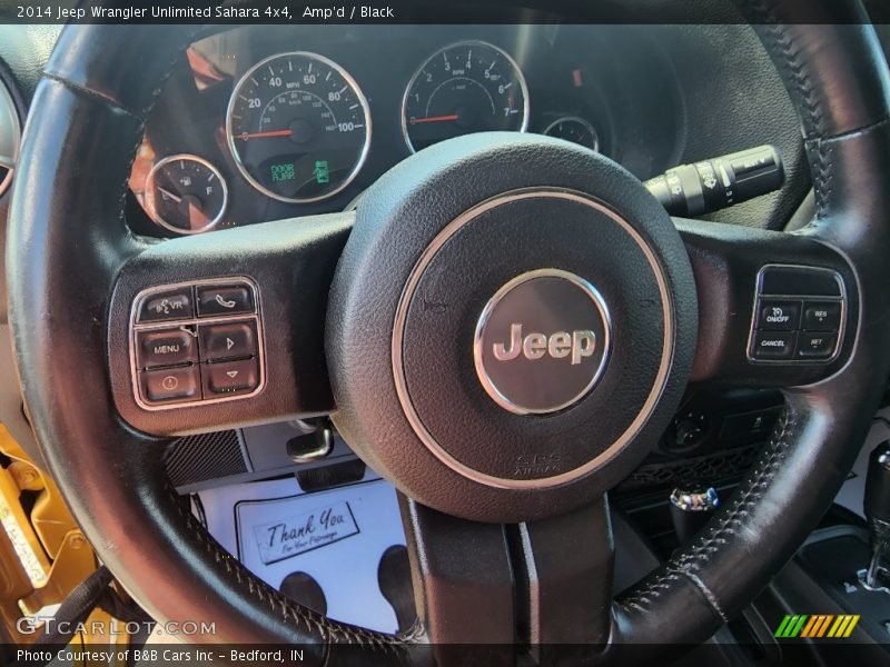 Amp'd / Black 2014 Jeep Wrangler Unlimited Sahara 4x4