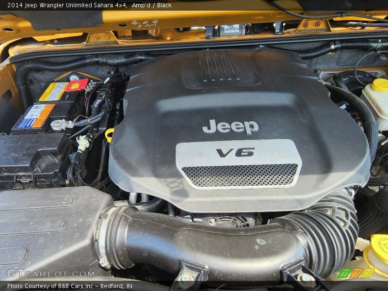 Amp'd / Black 2014 Jeep Wrangler Unlimited Sahara 4x4