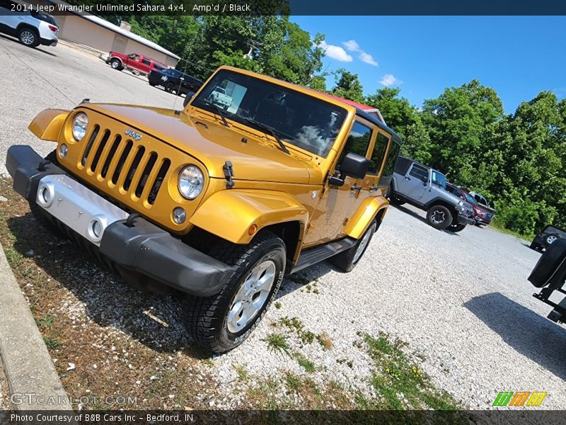 Amp'd / Black 2014 Jeep Wrangler Unlimited Sahara 4x4