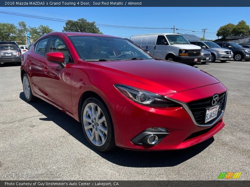 Front 3/4 View of 2016 MAZDA3 s Grand Touring 4 Door