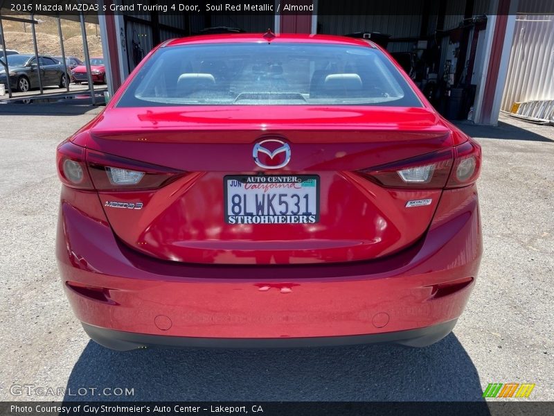 Soul Red Metallic / Almond 2016 Mazda MAZDA3 s Grand Touring 4 Door