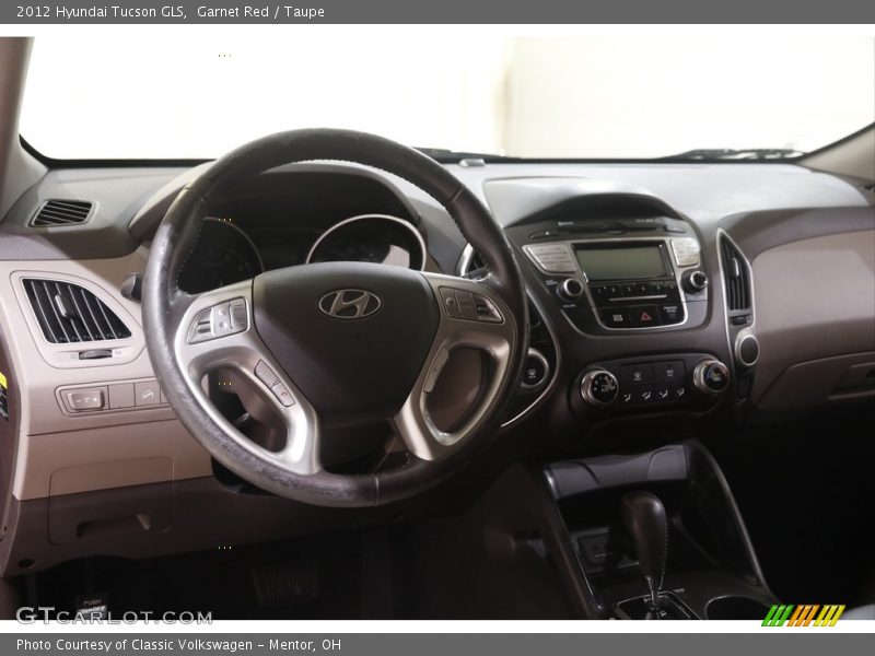 Garnet Red / Taupe 2012 Hyundai Tucson GLS