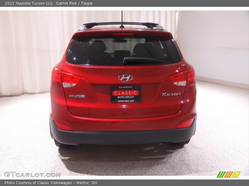 Garnet Red / Taupe 2012 Hyundai Tucson GLS