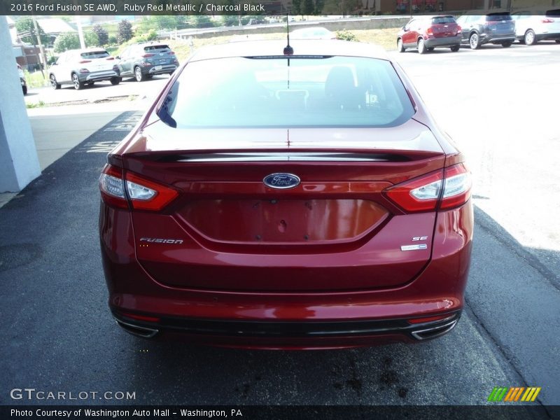 Ruby Red Metallic / Charcoal Black 2016 Ford Fusion SE AWD